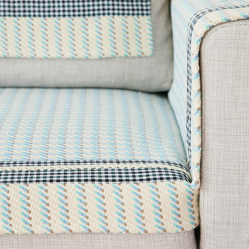 Handwoven breathable mattress topper with checkered decorative ribbon
