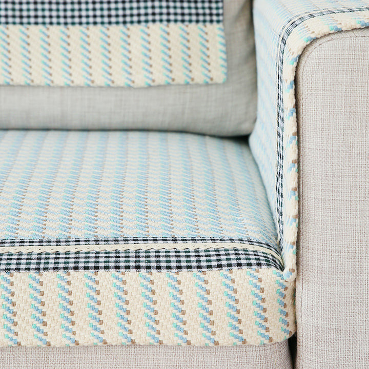Handwoven breathable mattress topper with checkered decorative ribbon