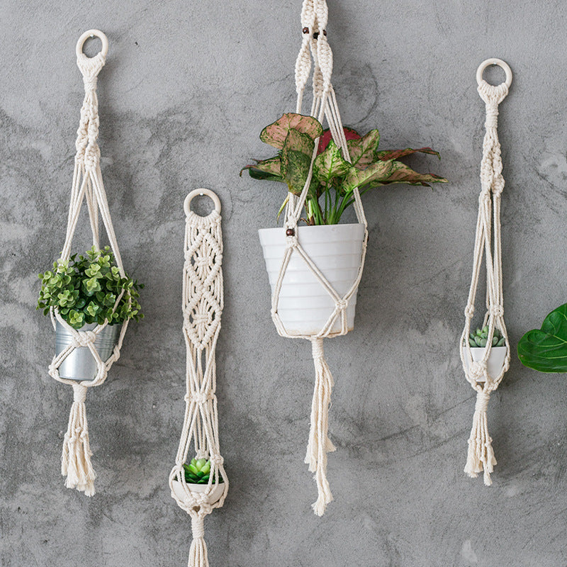 Macrame Plant Hanger Set made of cotton yarn hand-knotted with wooden ring and variable lengths