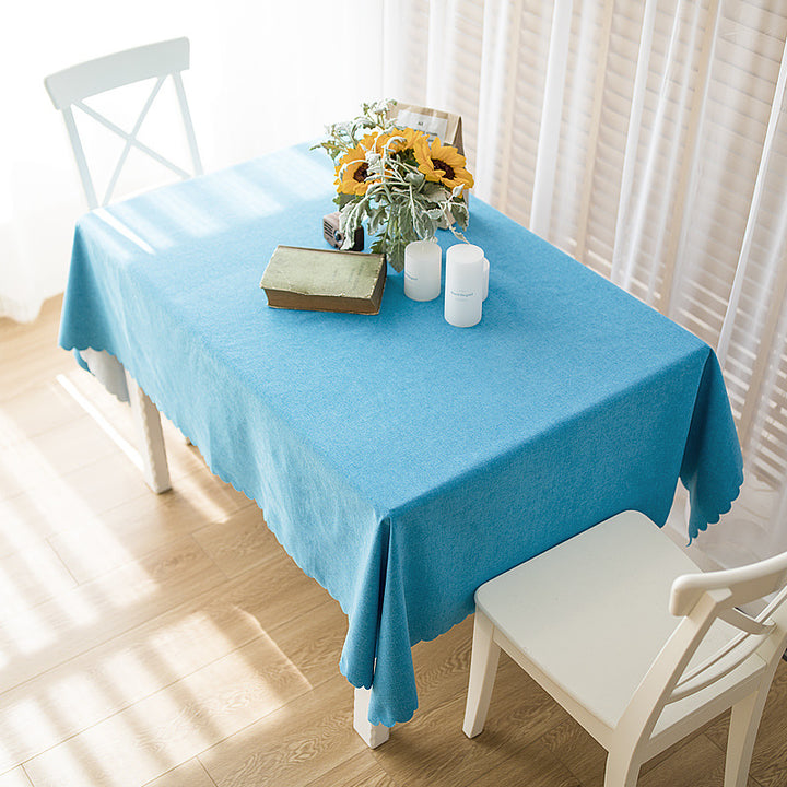 Rectangular tablecloth in linen look with wavy arc edge