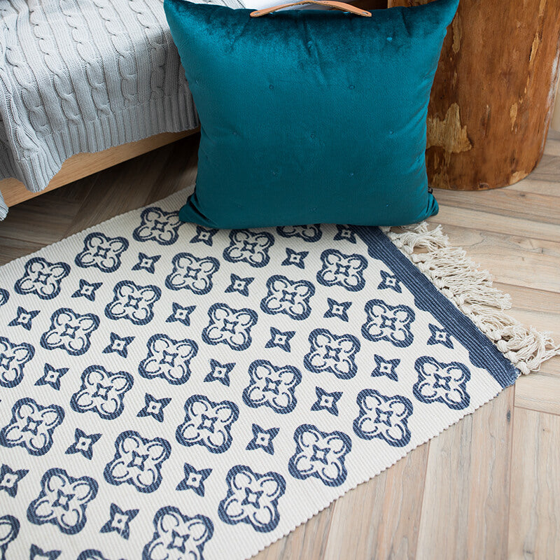 Woven decorative runner made of cotton blend with ethnic diamond pattern and fringes