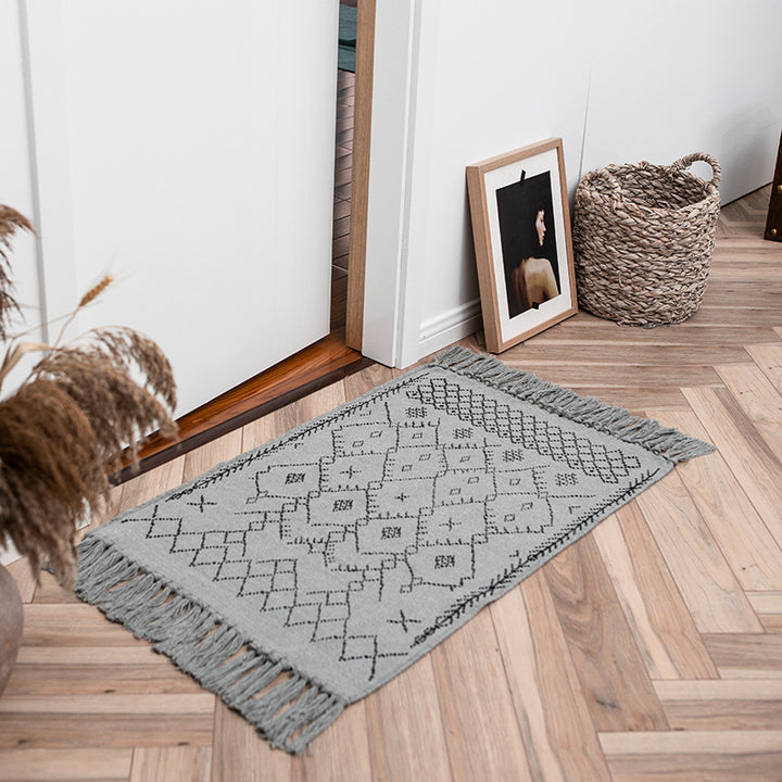 Flat-woven entrance and living room rug with Moroccan diamond jacquard and decorative fringes