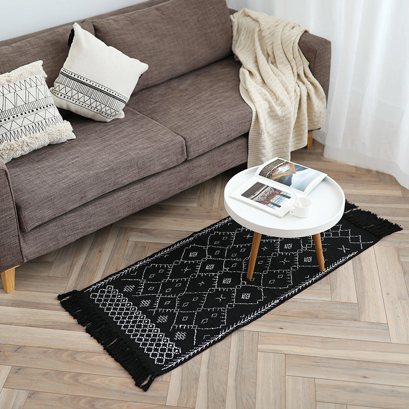 Flat-woven entrance and living room rug with Moroccan diamond jacquard and decorative fringes
