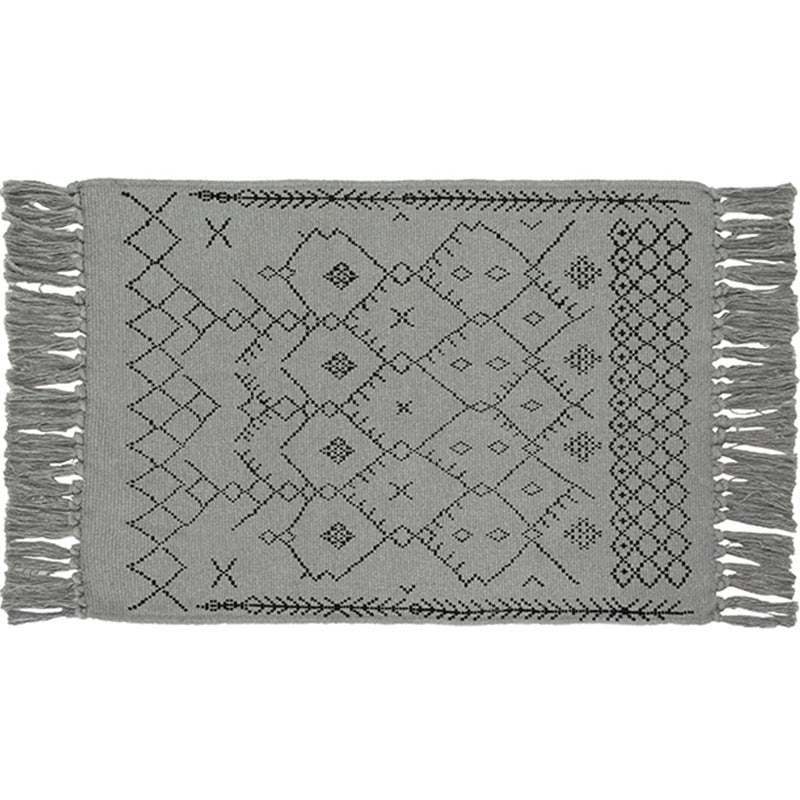 Flat-woven entrance and living room rug with Moroccan diamond jacquard and decorative fringes