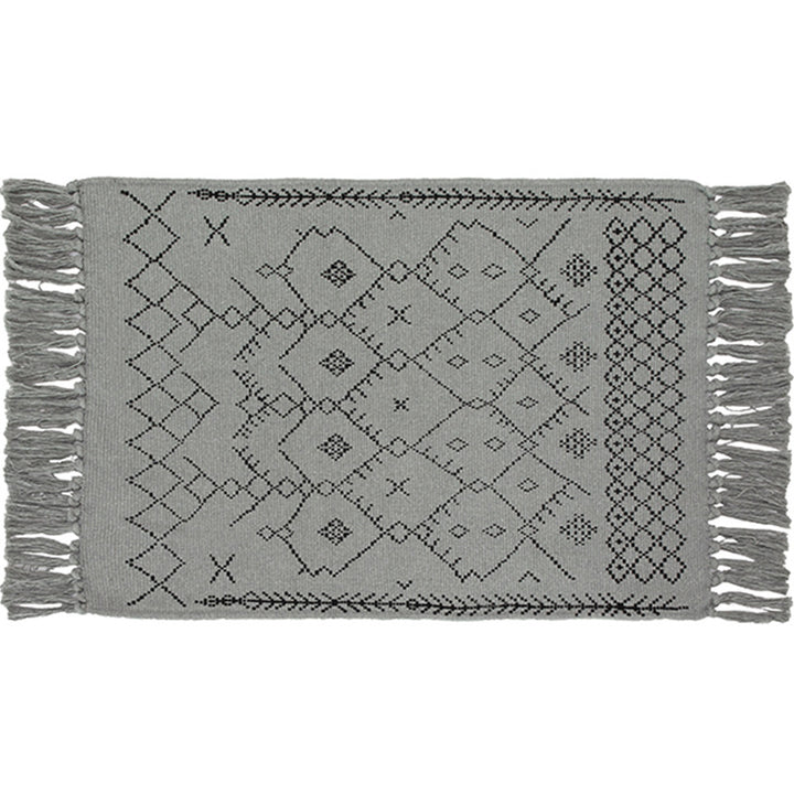 Flat-woven entrance and living room rug with Moroccan diamond jacquard and decorative fringes