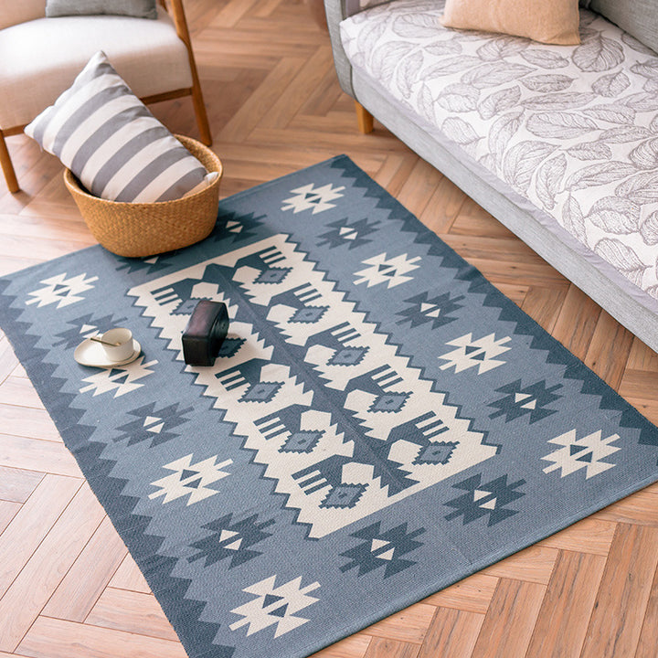 Flat-woven cotton runner with Mediterranean tile jacquard and decorative fringes