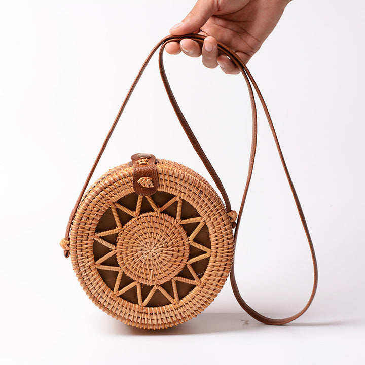 Elegant round handbag made of woven rattan