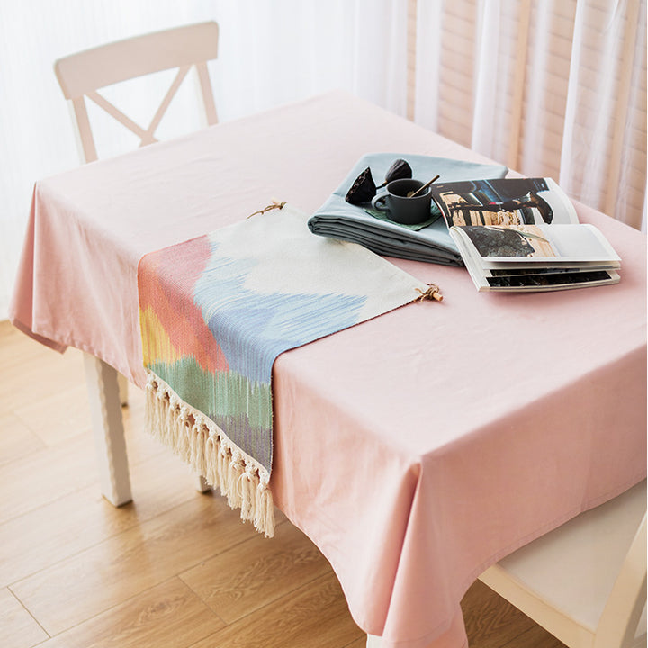 Woven Boho table runner with fringes and abstract watercolor pattern