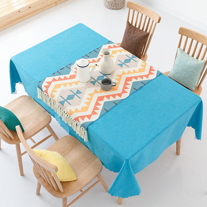 Flat-woven cotton carpet runner with ethnic diamond pattern and decorative fringes