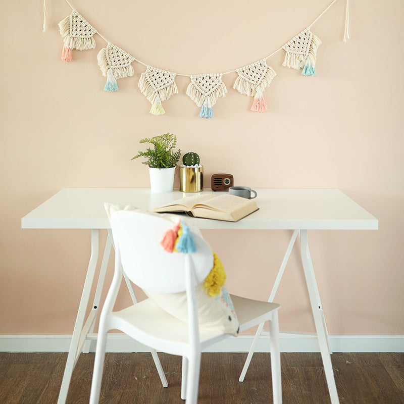 Macrame pennant string with hand-knotted triangle elements and tassels