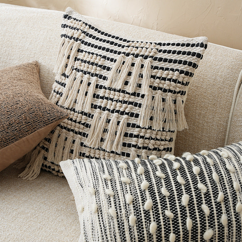 Woven decorative cushion cover with hand-tufted tassels and concealed zipper