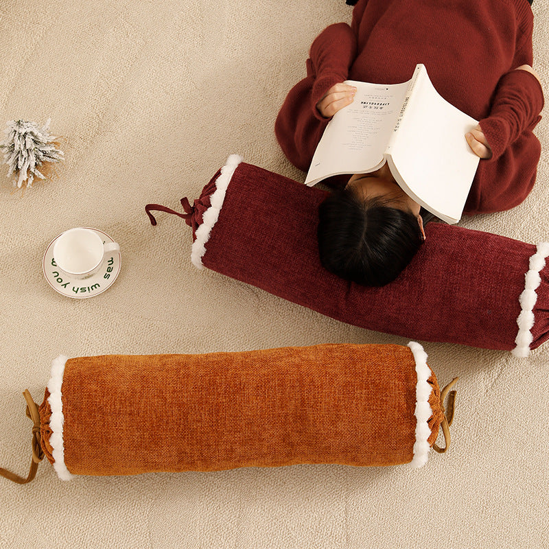 Cylindrical lumbar and neck pillow with velvety chenille surface and crocheted trim