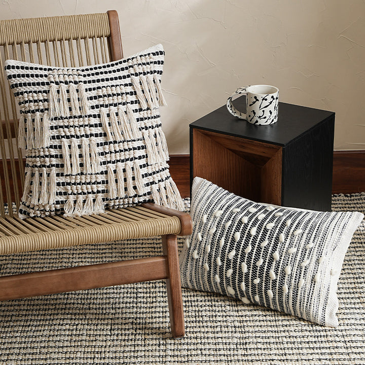 Woven decorative cushion cover with hand-tufted tassels and concealed zipper