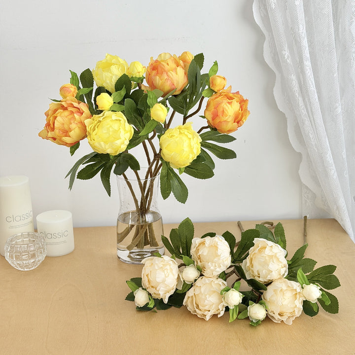 Artificial peony bouquet with delicate flowers and leaves