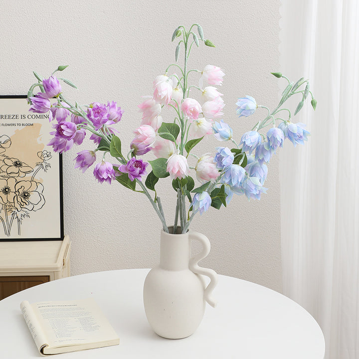 Artificial orchid bouquet with intricate flowers