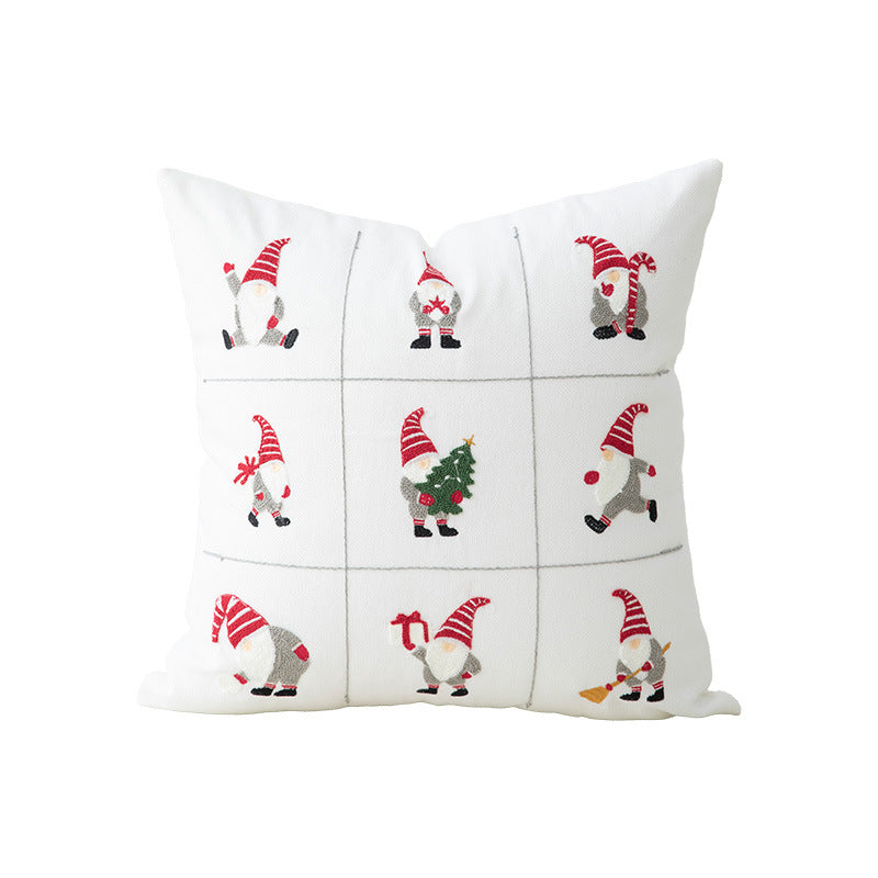Festive embroidered decorative pillow with reindeer motif and removable cover