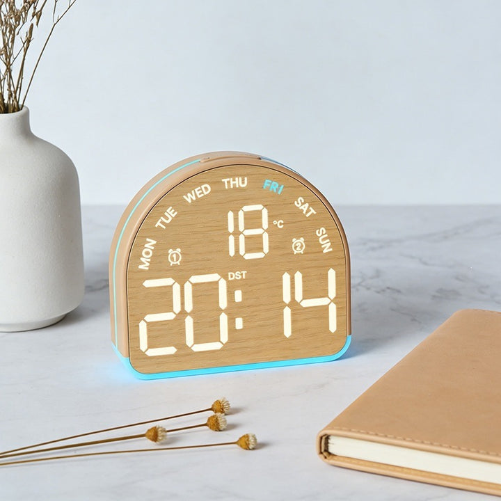Digital alarm clock with temperature sensor and date display