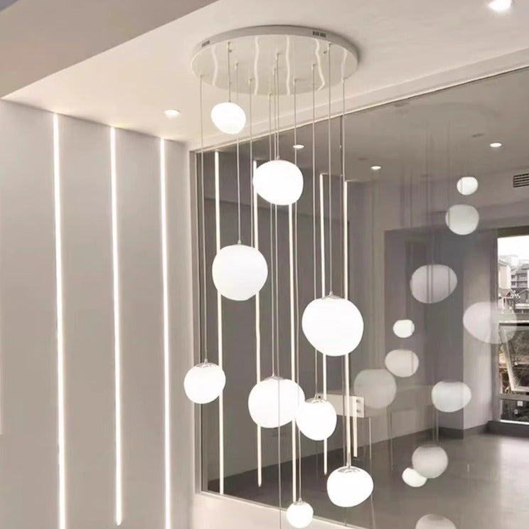 Modern multi-level LED pendant light with satin oval disc shades