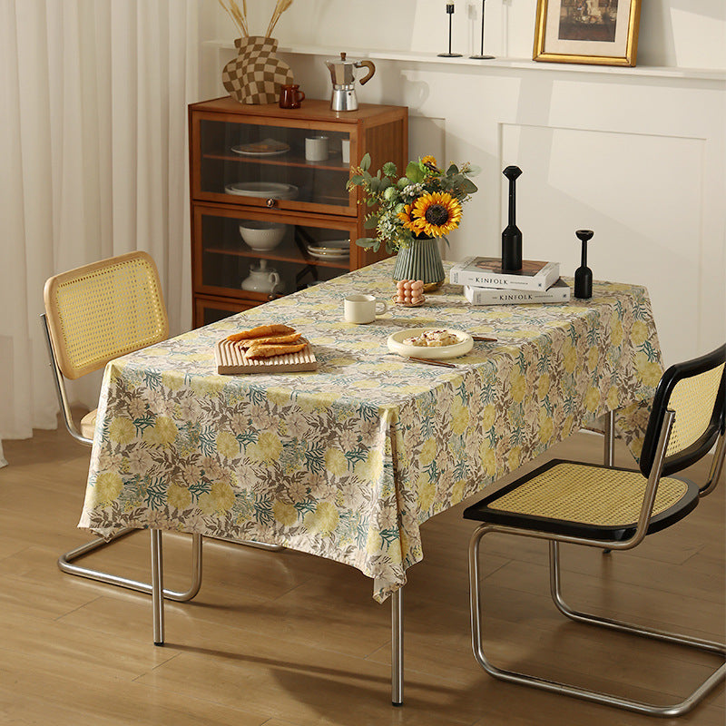 Wipeable tablecloth made of polyester with floral watercolor look and water-repellent coating