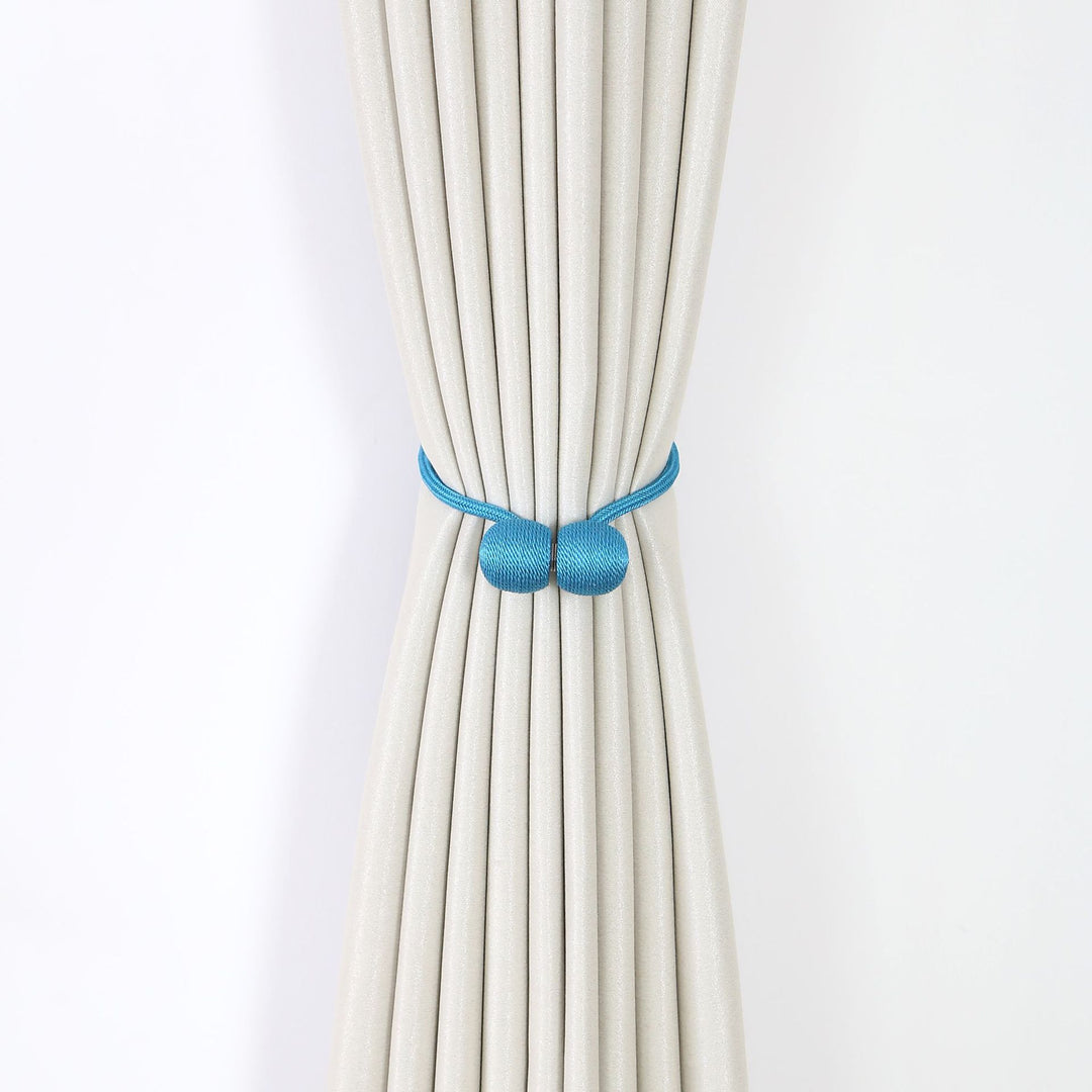 Decorative curtain tieback