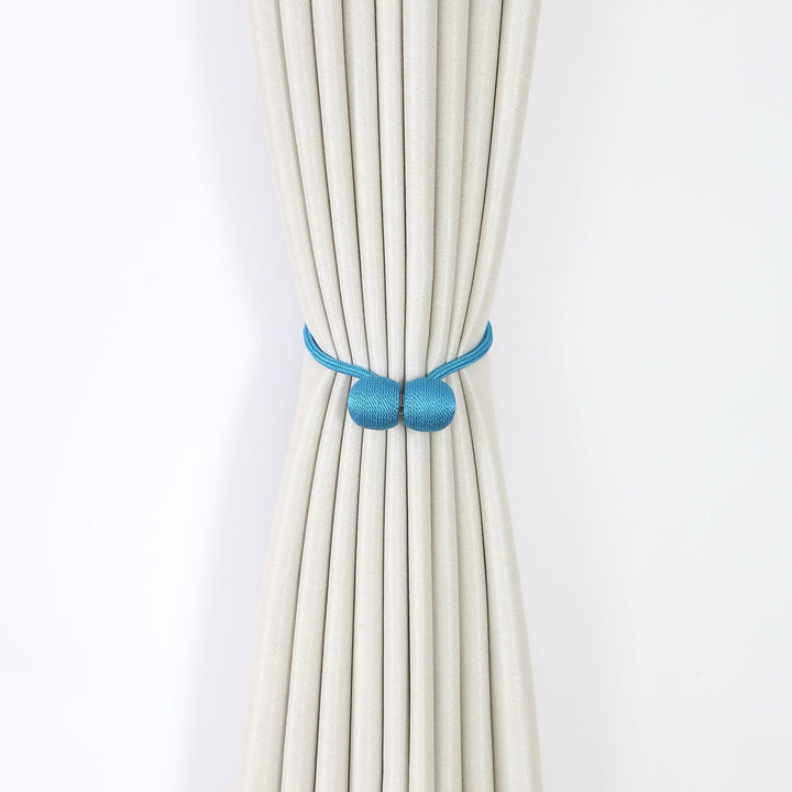 Decorative curtain tieback