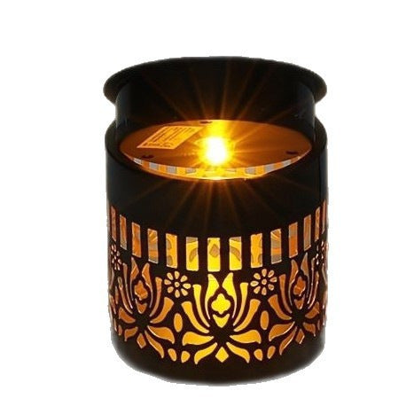 Decorative filigree metal tealight lantern with reflective inner lining