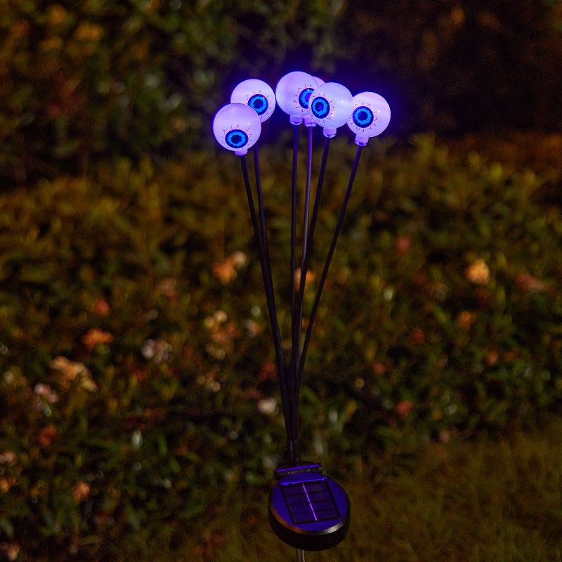 Creepy garden lights with eye motif