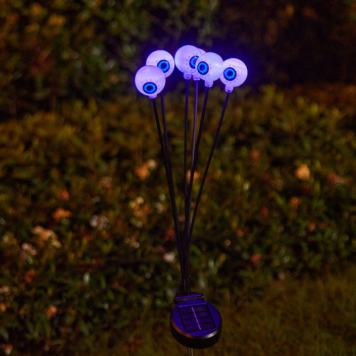 Creepy garden lights with eye motif