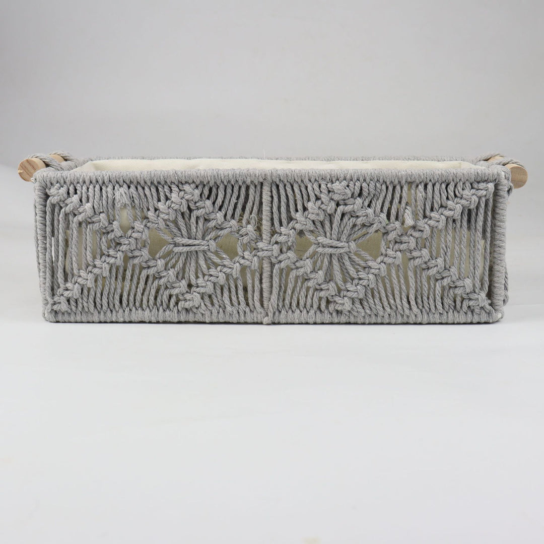 Storage basket with macrame pattern