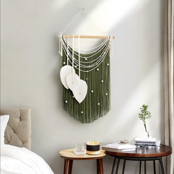 Artistic wall hanging made of macrame with hearts