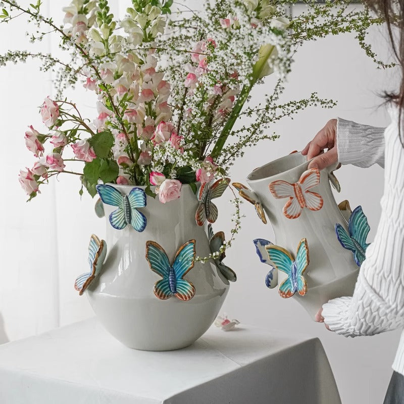 Decorative flower vase with butterflies