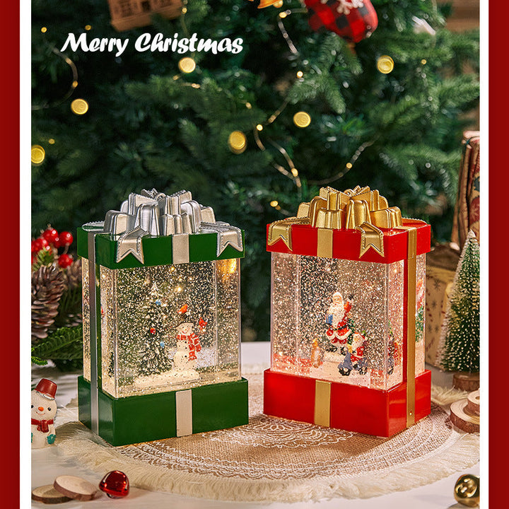 Illuminated Christmas lantern with snow and Christmas motif