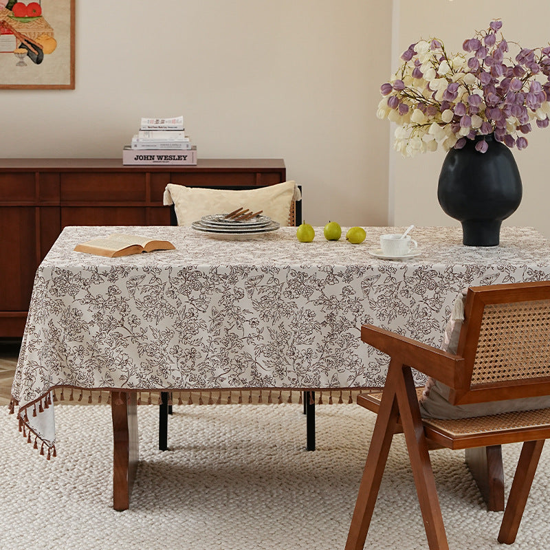 Rectangular high-quality tablecloth made of cotton-linen with hand-printed floral pattern and tassel border