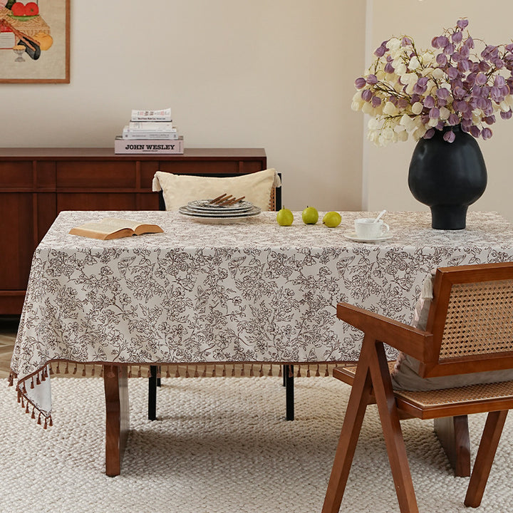 Rectangular high-quality tablecloth made of cotton-linen with hand-printed floral pattern and tassel border
