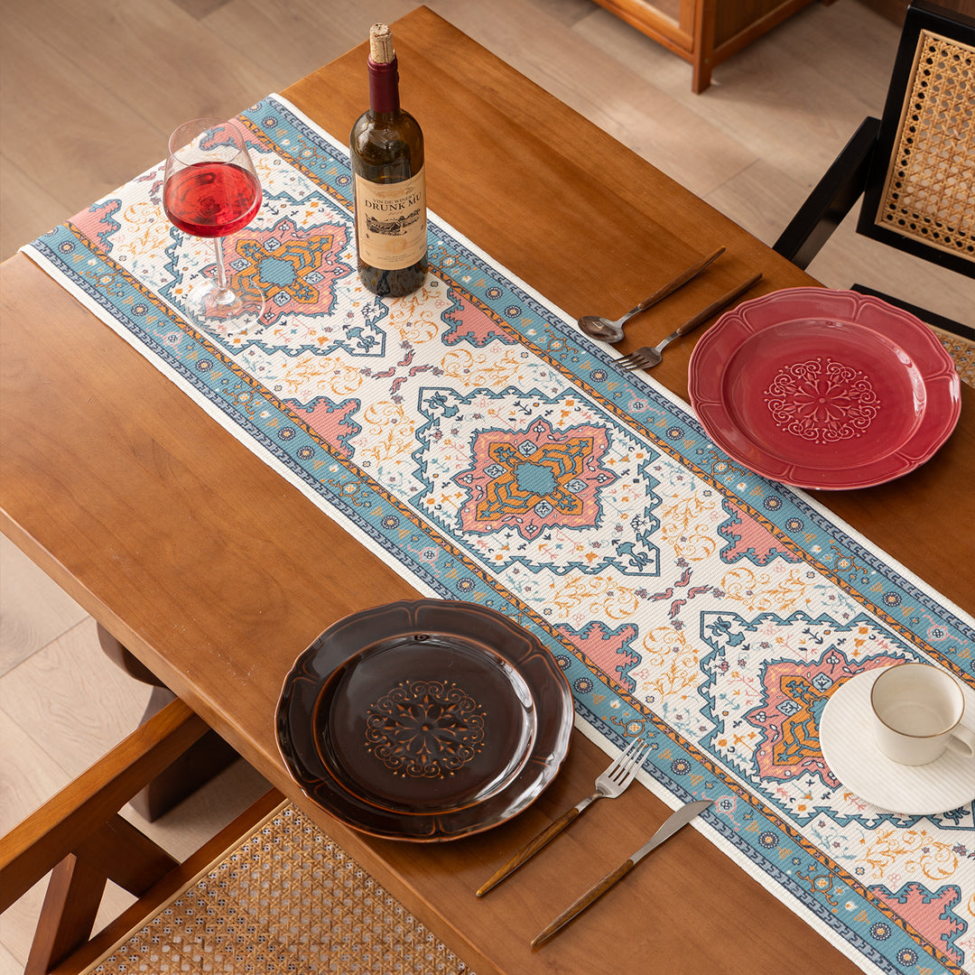Woven table runner made of cotton blend with oriental medallion pattern and fringes