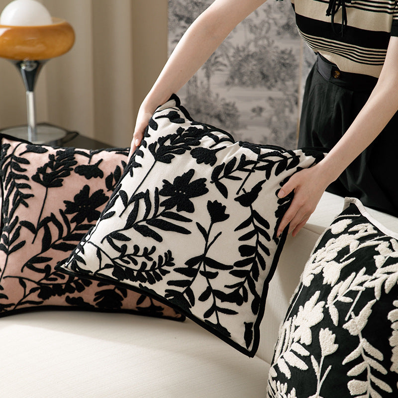 Decorative cushion cover with floral flock application