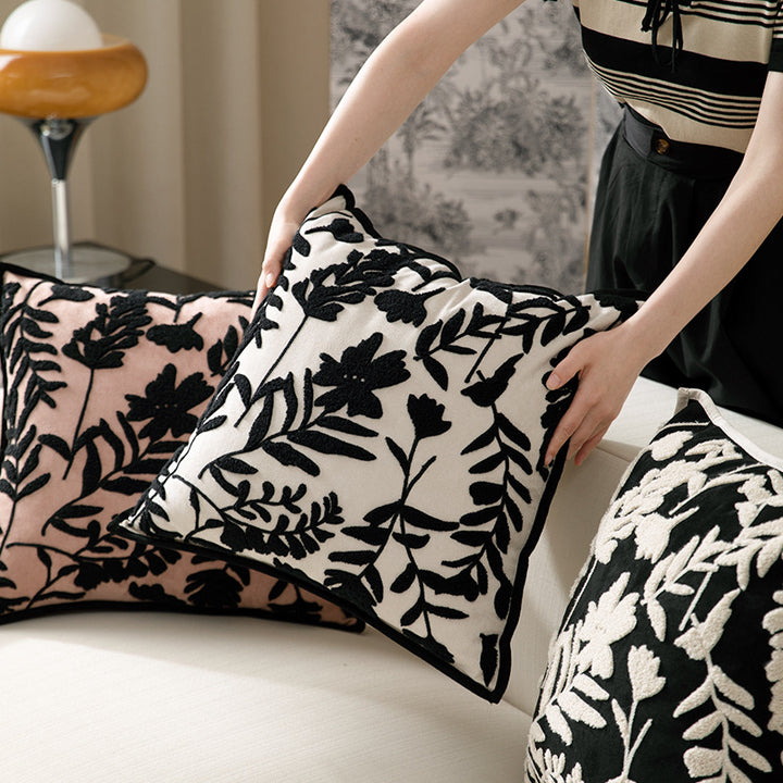 Decorative cushion cover with floral flock application