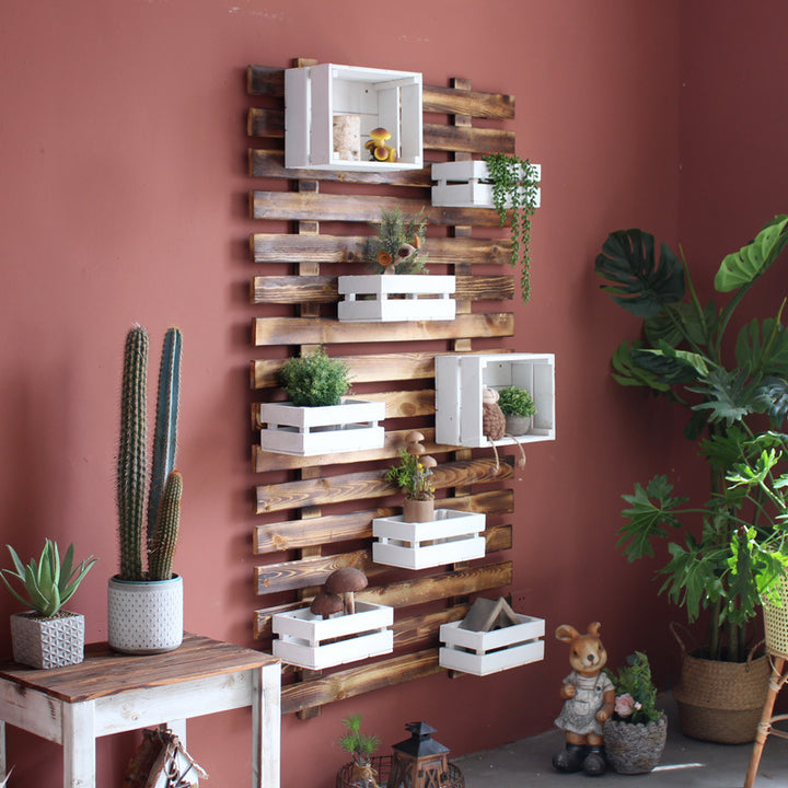 Wall shelf system with integrated storage boxes