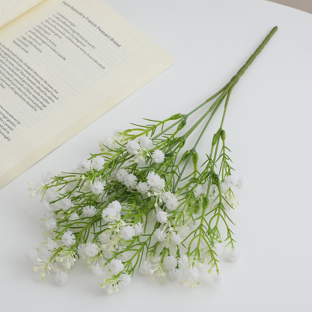 Decorative artificial flower branch with delicate purple flowers