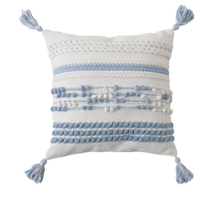Structured decorative pillow with tufted diamonds, relief border, and corner tassels
