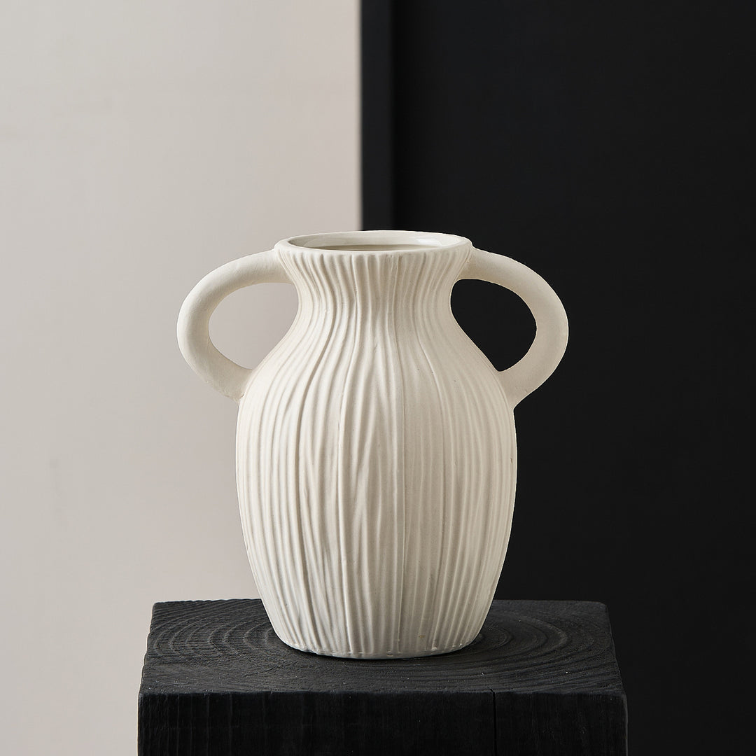 Decorative ceramic vase with artistic ribbed pattern