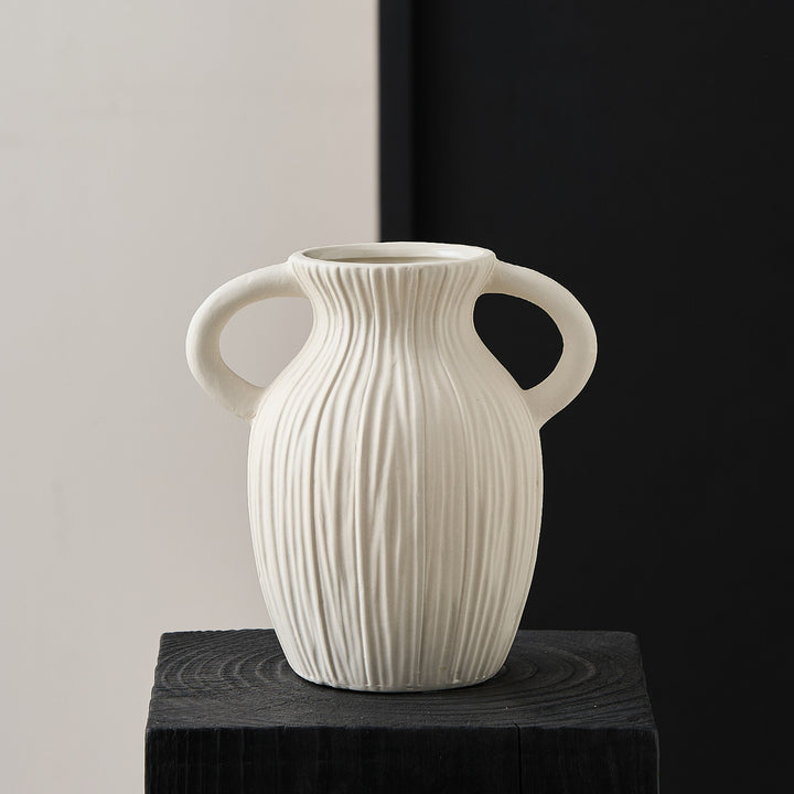 Decorative ceramic vase with artistic ribbed pattern