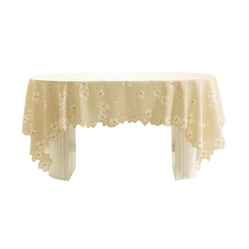 Round wipeable tablecloth with floral cut-out hem