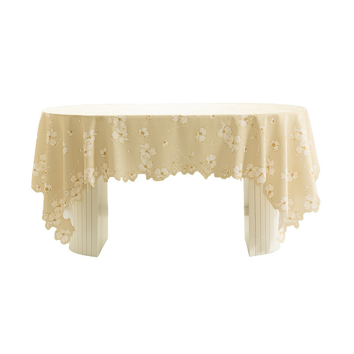 Round wipeable tablecloth with floral cut-out hem