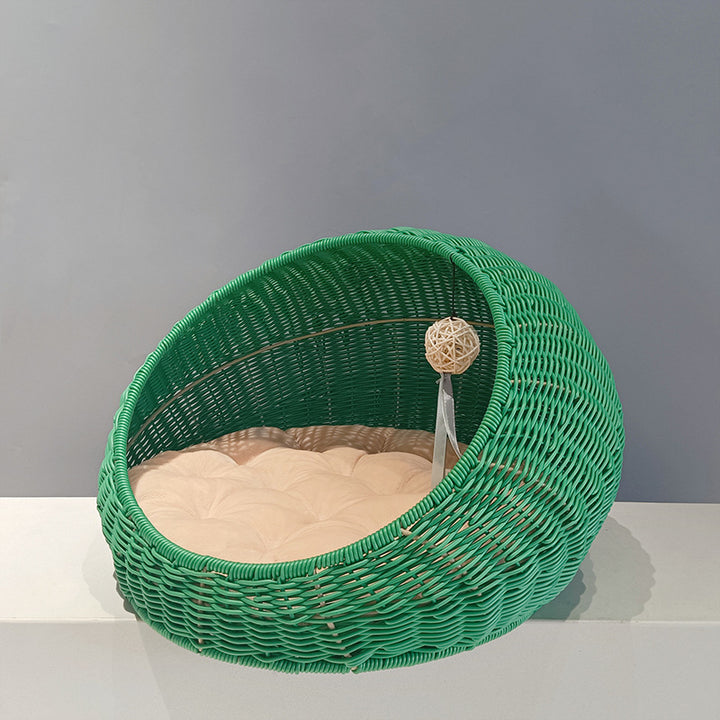 Cozy cat bed made of woven natural material