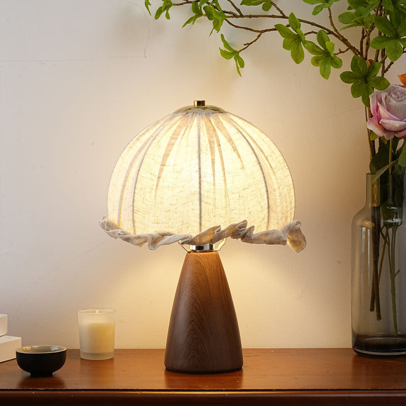 Handmade linen ruffle table lamp with walnut pyramid base