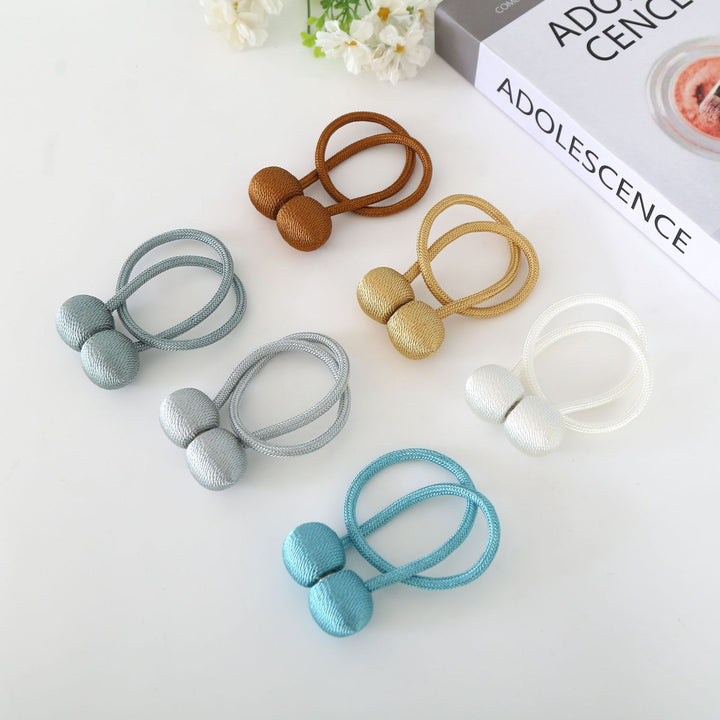 Decorative curtain tieback