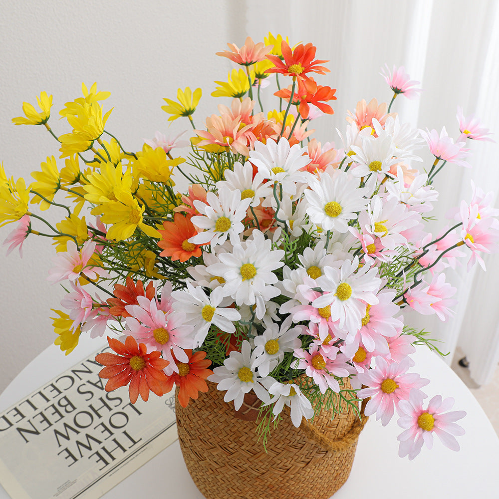 Artificial flower branch with bright blooms and delicate leaves