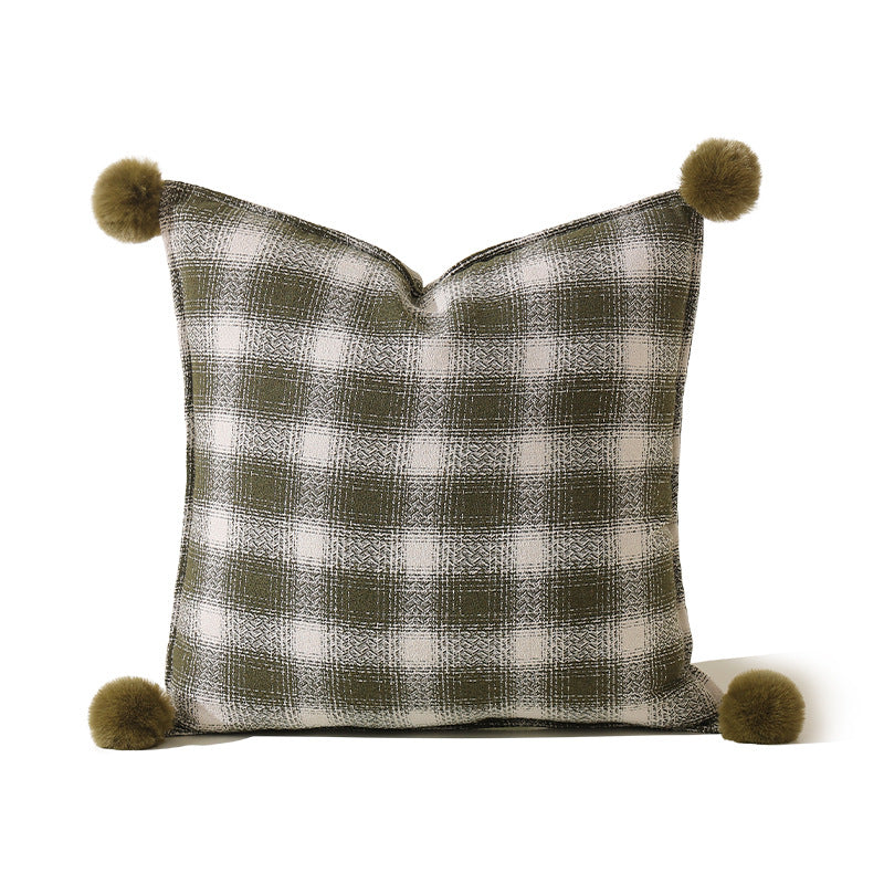 Decorative square cushion cover with pompom corners and checkered jacquard pattern