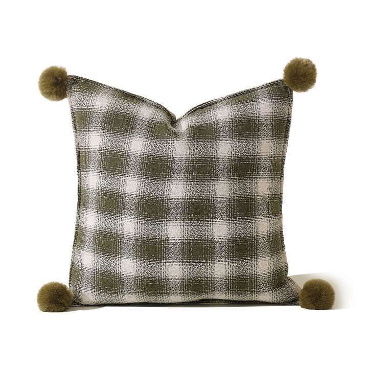 Decorative square cushion cover with pompom corners and checkered jacquard pattern